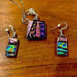 Beautiful dichroic glass pink blue black necklace and earring set. Silver chain.